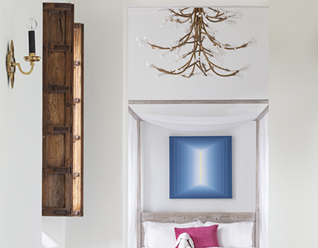 Custom home detail of a corridor with window and chandelier in Houston, TX